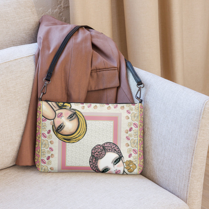 Le Jardin des Muses crossbody bag styled beside a leather jacket